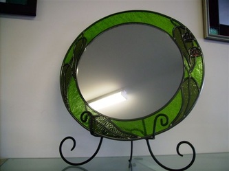 Round mirror with gumleaves Aprox 400mm across 